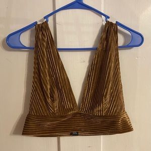 bronze bralette size large ordered from shein. the brand on the tag is SBetro.